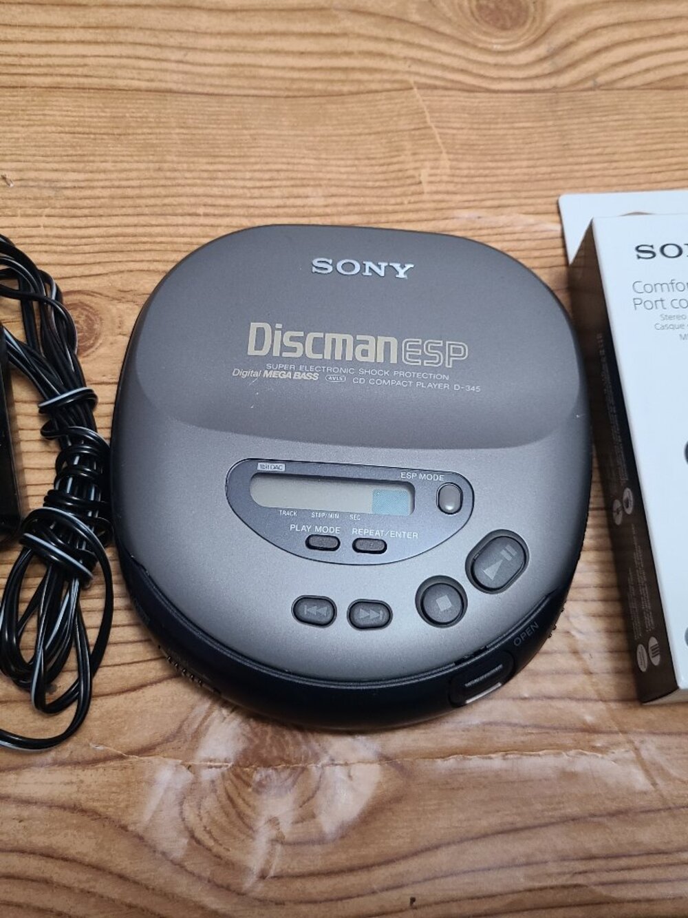 Sony Discman with new earphones and power adapter